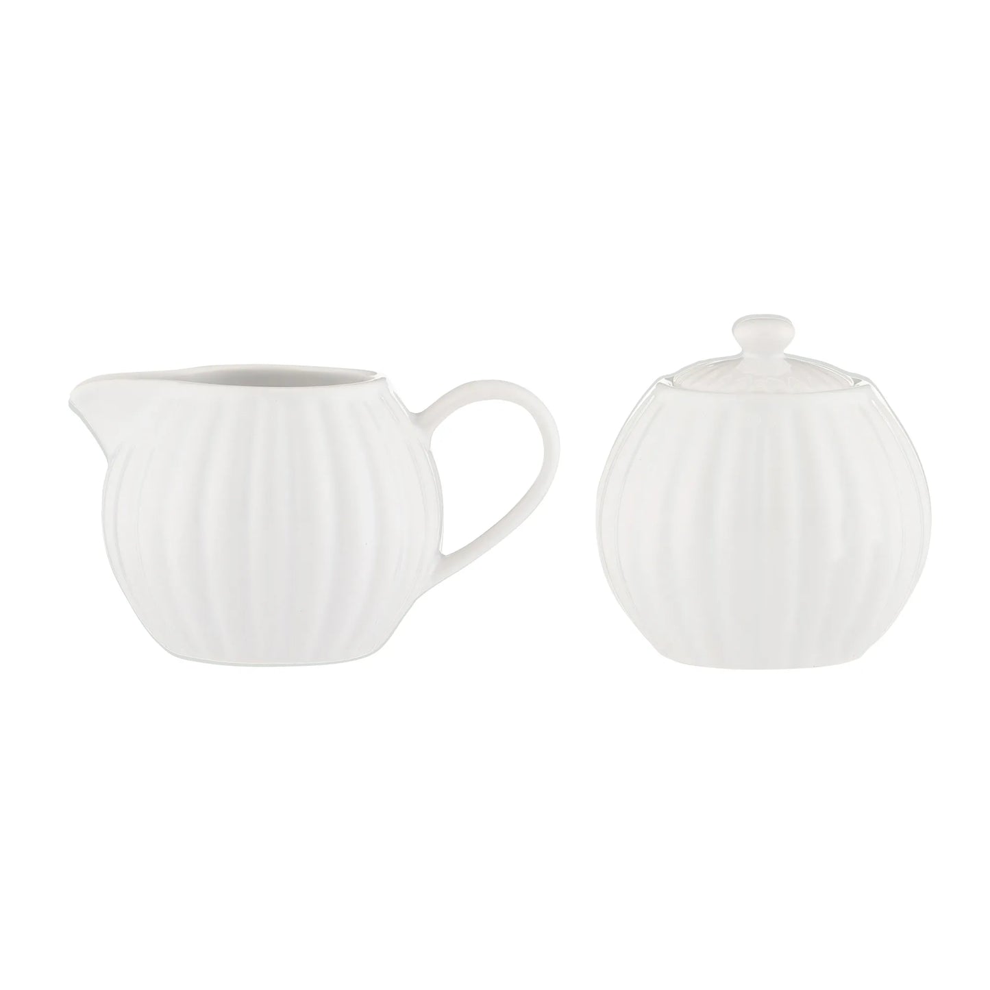 White ceramic teapot and matching lid on a white background