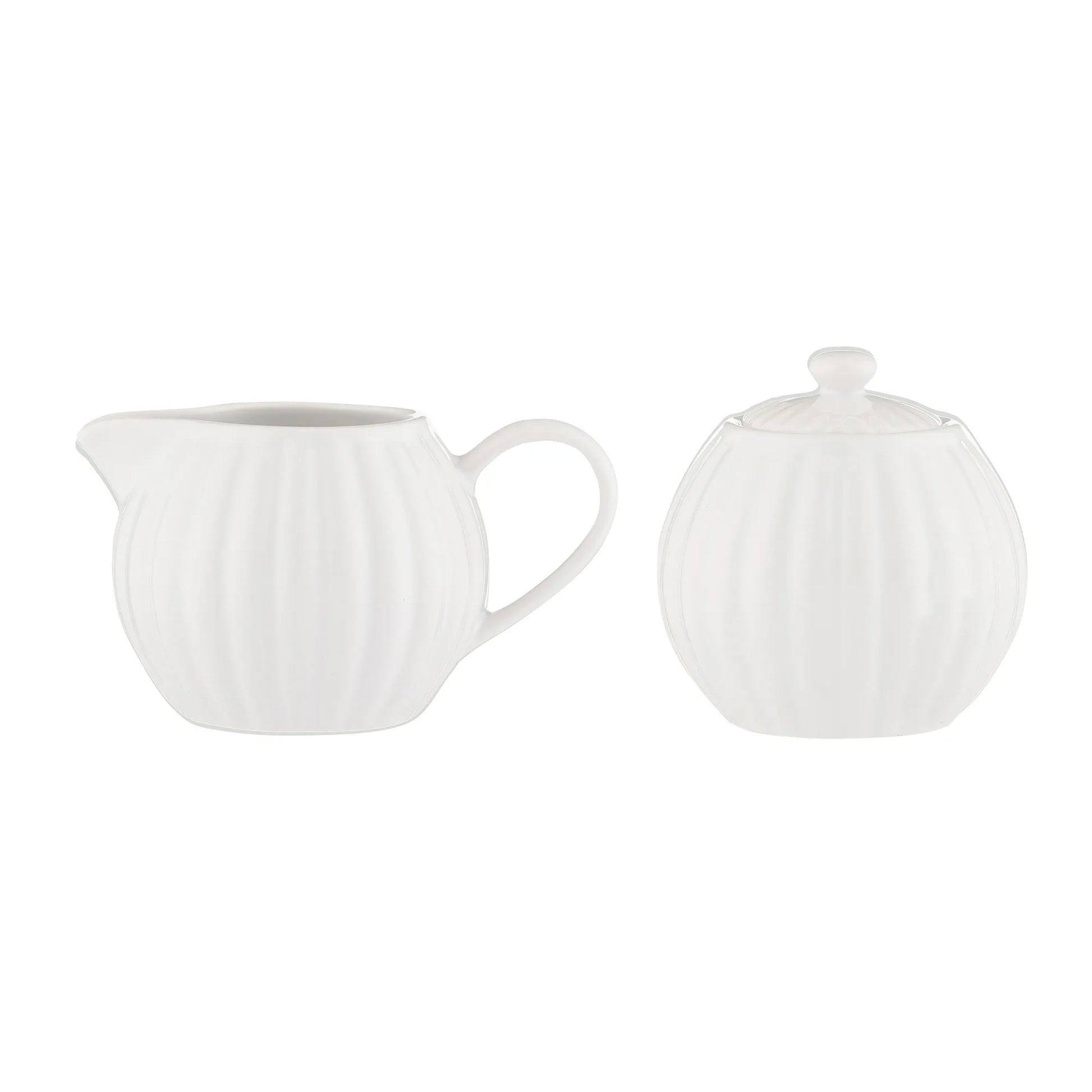 White ceramic teapot and matching lid on a white background