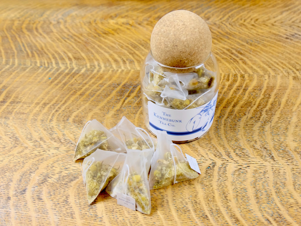 Organic chamomile tea bags in a glass jar