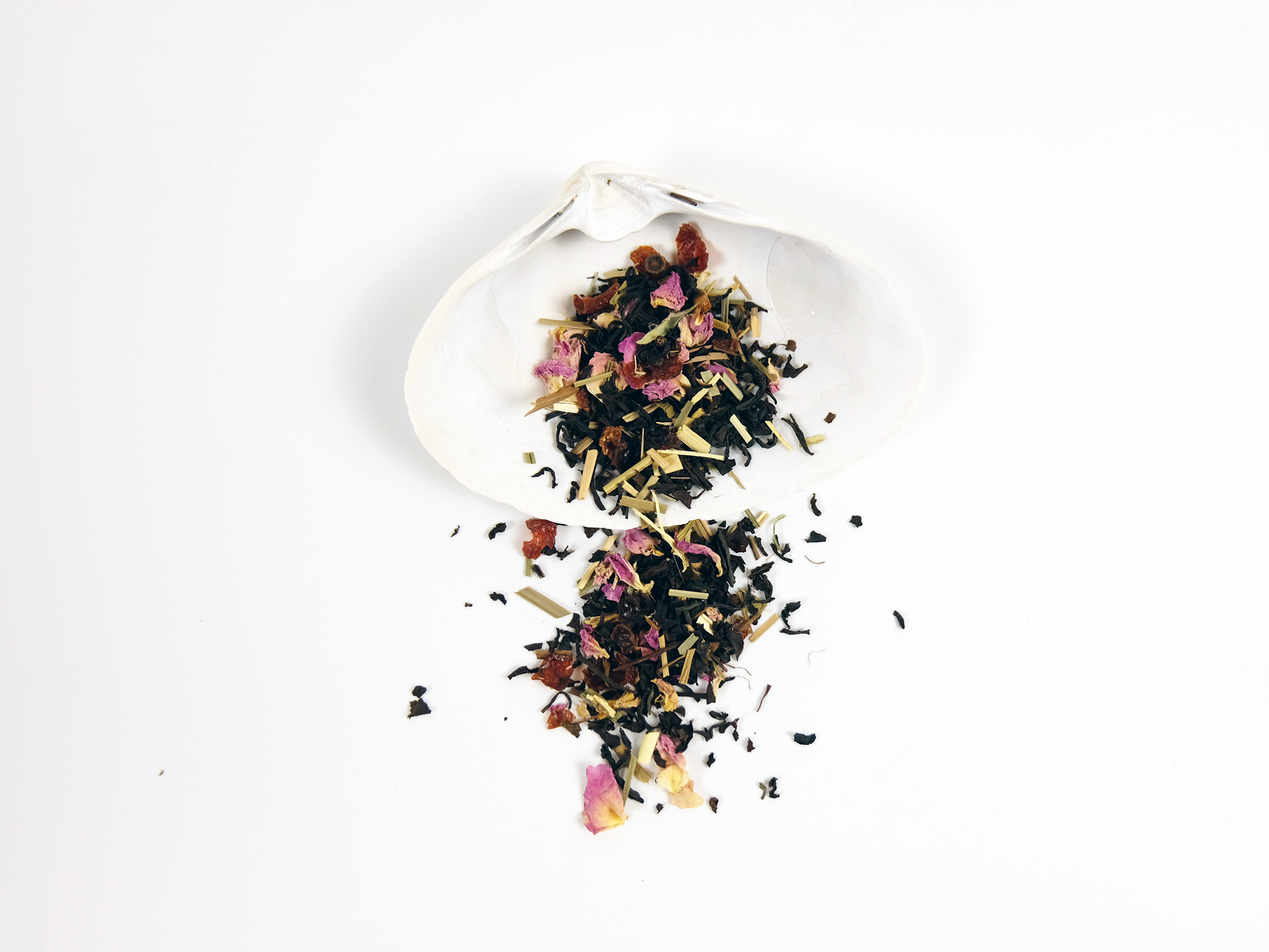 Beach Rose Black Tea loose leaf tea on a white shell