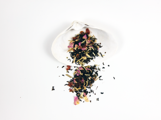 Beach Rose Black Tea loose leaf tea on a white shell