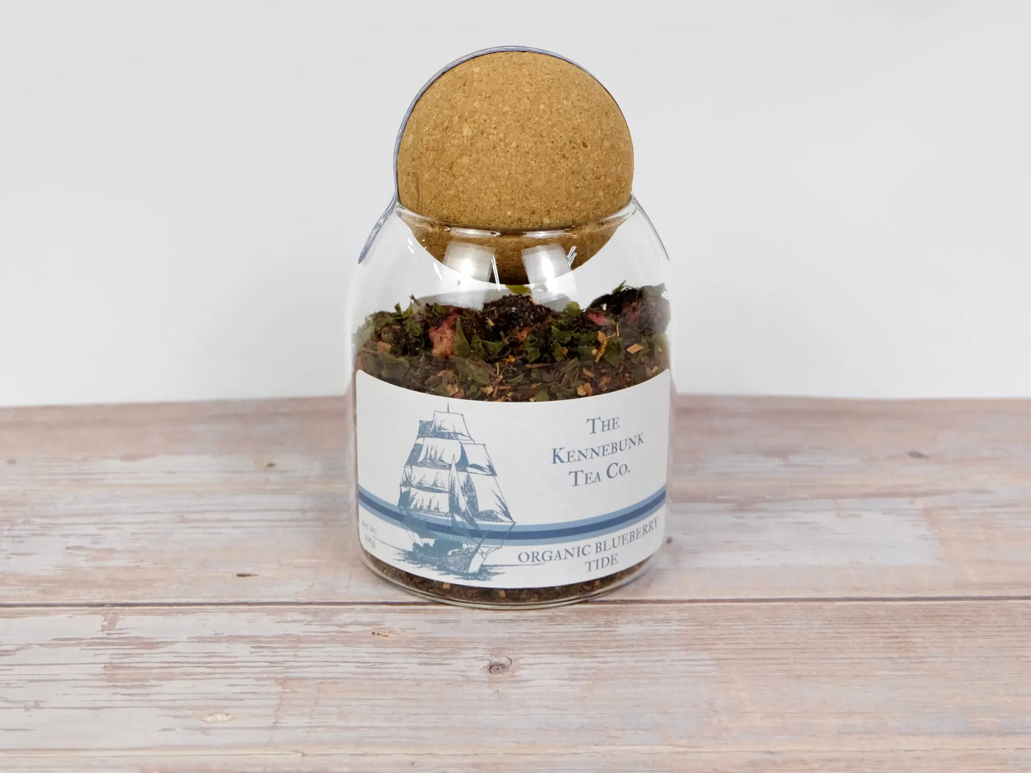 Blueberry Tide loose leaf tea in a glass jar with Clipper Ship label