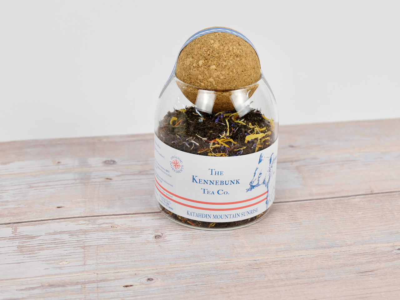 Katahdin Mountain Sunrise Tea loose leaf tea in a glass jar with bear label