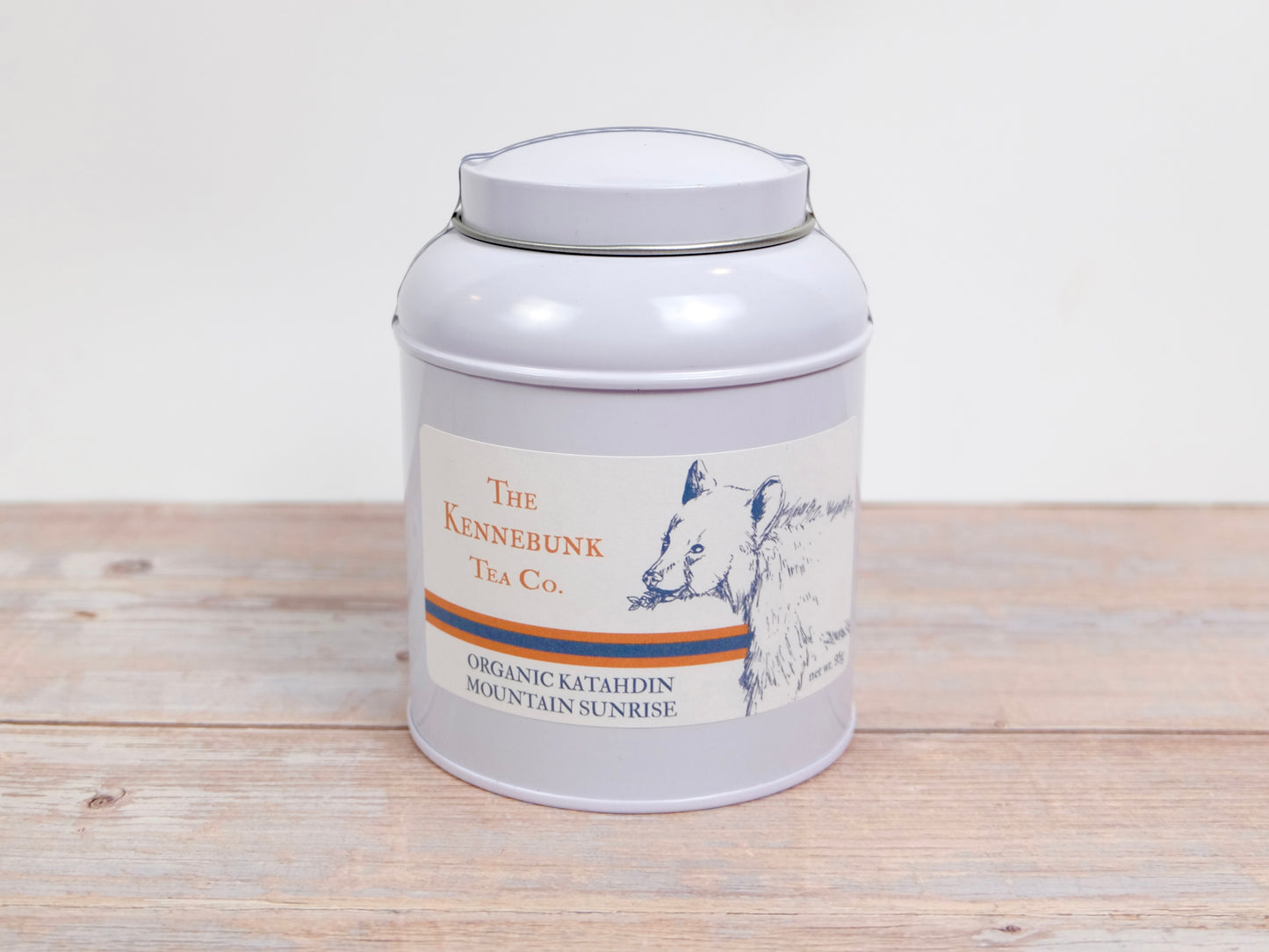 Katahdin Mountain Sunrise Tea loose leaf tea in a tin with bear label