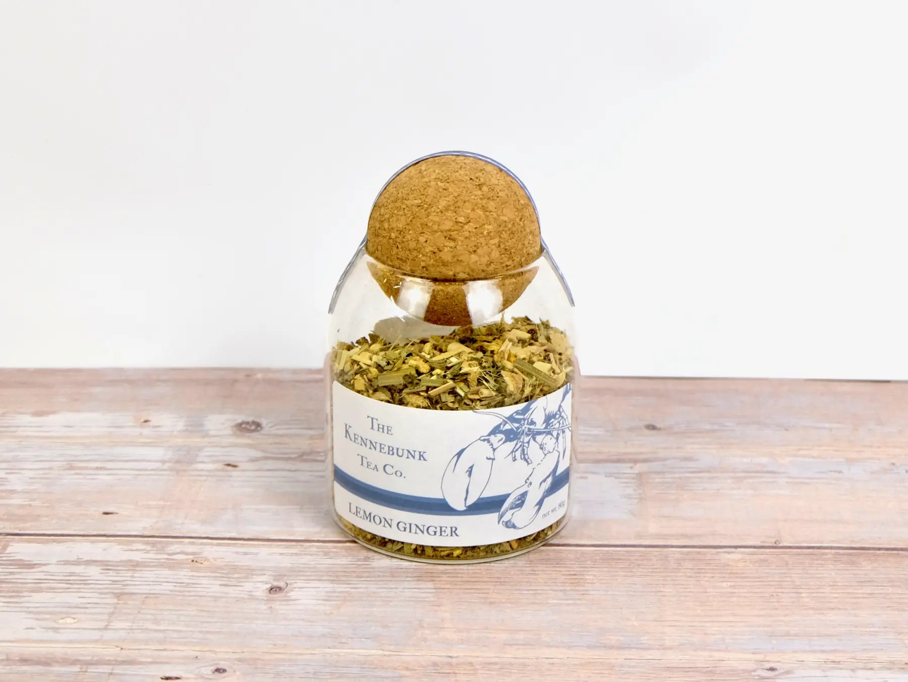 Lemon Ginger Tea loose leaf tea in a glass jar with lobster label