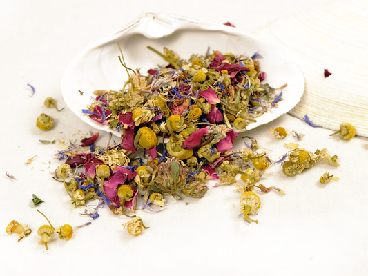 New England Garden Tea loose leaf tea displayed on a white shell