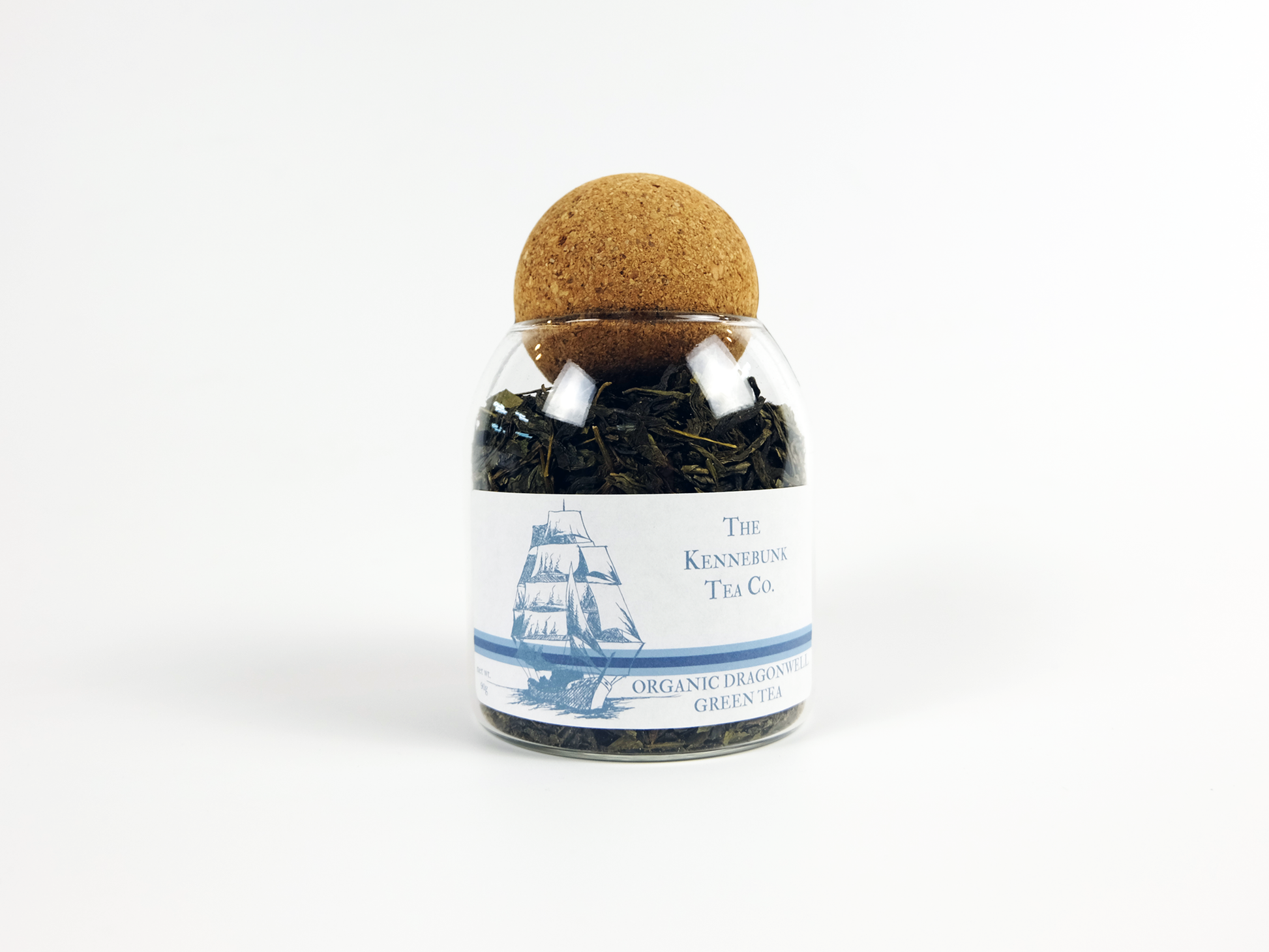 Organic Dragon Well Tea loose leaf tea in a glass jar with Clipper Ship label