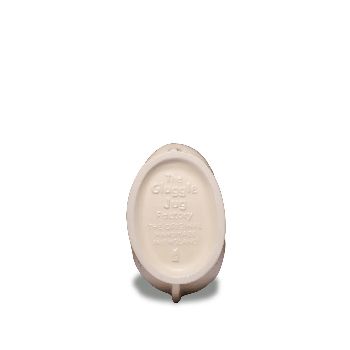 Matte cream ceramic product with 'The Gluggle Jug Factory handmade in England' text on a white background