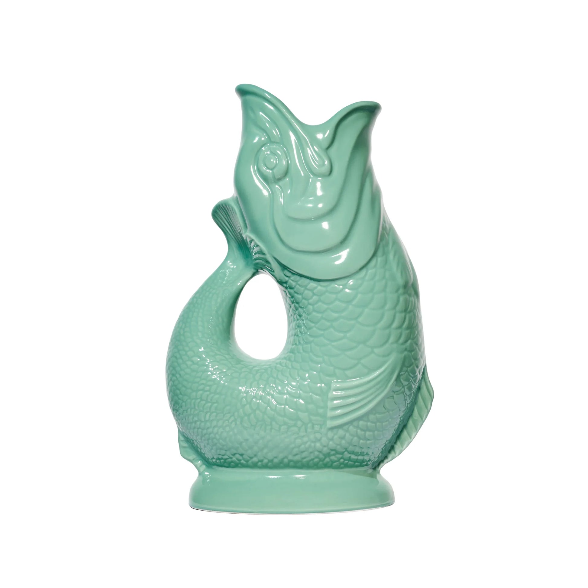 Side view of sea green ceramic fish-shaped gluggle jug 