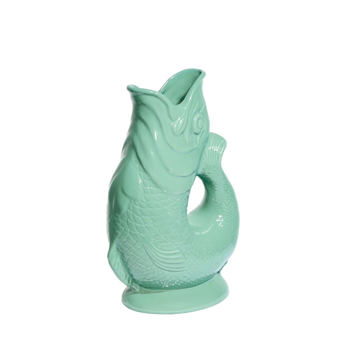 Sea green fish-shaped gluggle jug on a white background